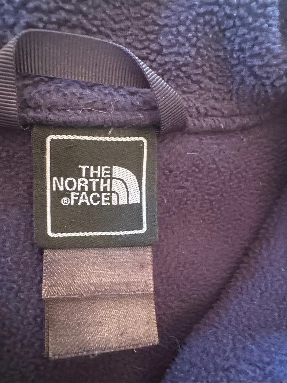 The North Face Kids' Navy Fleece Jacket with Pink/Purple Trim
